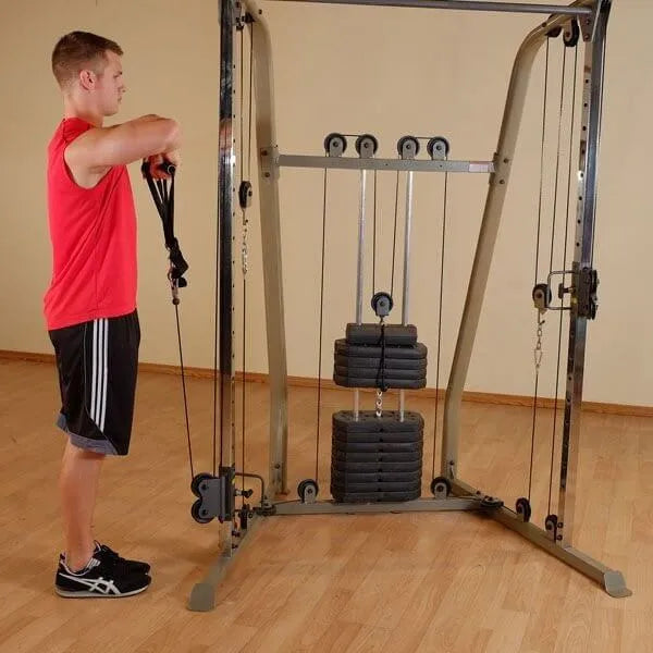 Best Fitness BFFT10R Functional Trainer - man standing having arms and chest exercise