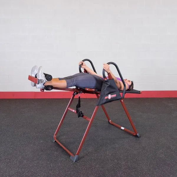 Best Fitness BFINVER10 Inversion Table - woman on gym trying out while on the table 