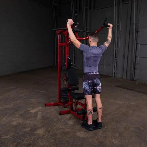 Best Fitness BFMG30 Multi Station Gym - man standing and pull up workout