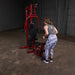 Best Fitness BFMG30 Multi Station Gym - woman pulling rope exercise