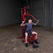 Best Fitness BFMG30 Multi Station Gym - man holding pull up station