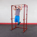 Best Fitness BFPR100 Power Rack - Man pulled up in front position 