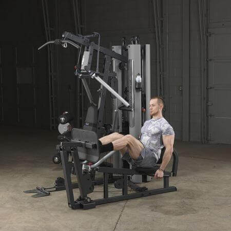 Body-Solid Bi-Angular Multi-Stack Gym G10B - Male model doing extreme leg workout