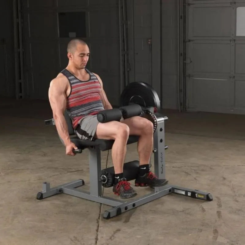 Body-Solid Cam Series Leg Extension and Curl GCEC340 - Man sitting