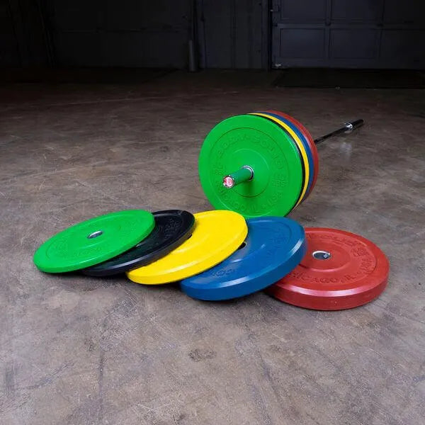 Body-Solid Chicago Extreme Colored Bumper Plates OBPXC -  different plate on floor and a rod with 4 plates