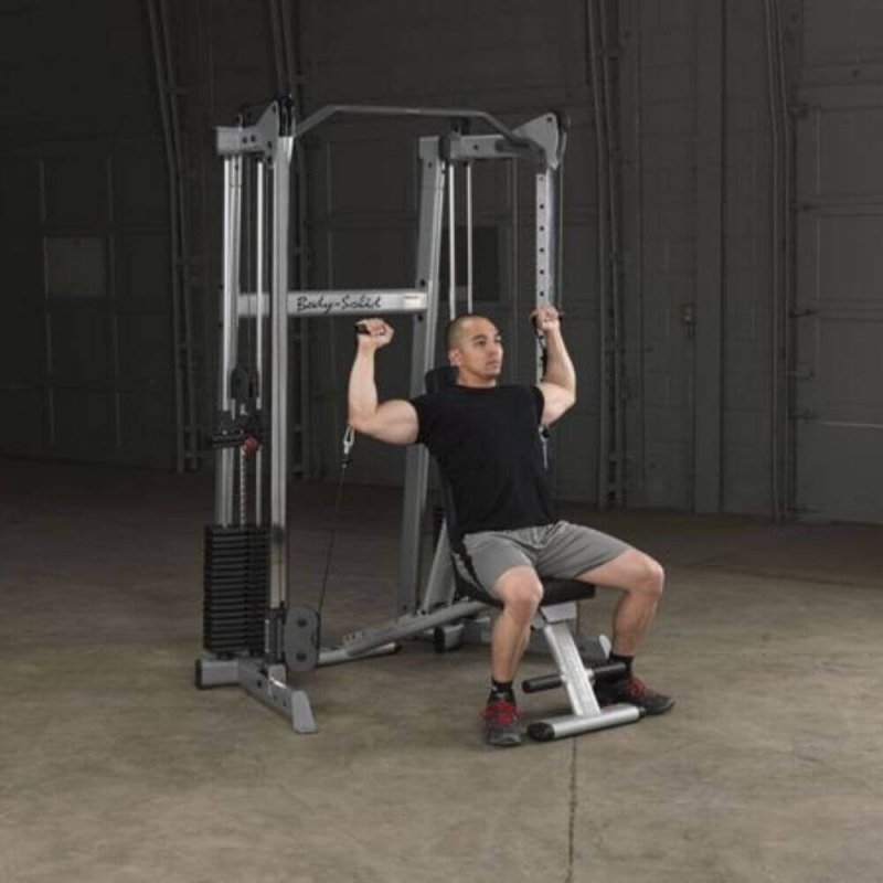 Body-Solid Compact Functional Training Center GDCC210 - Man working out inclined press