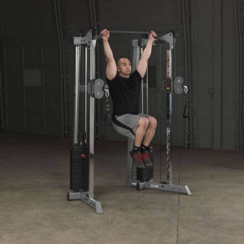 Body-Solid Compact Functional Training Center GDCC210 - Man lifting and pull up exercise 