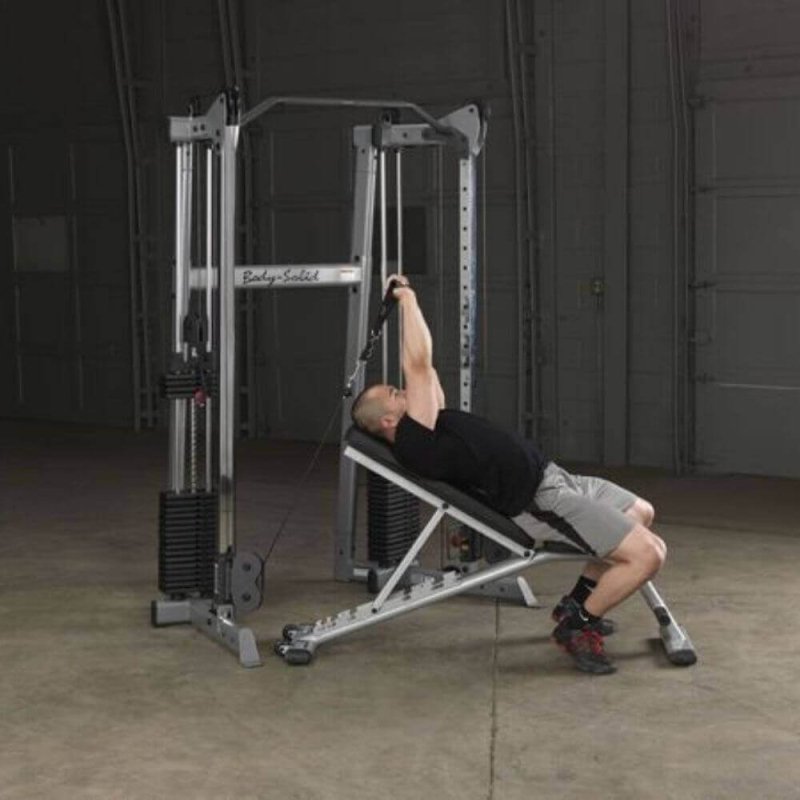 Body-Solid Compact Functional Training Center GDCC210 - Man on bench doing skull crusher workout 