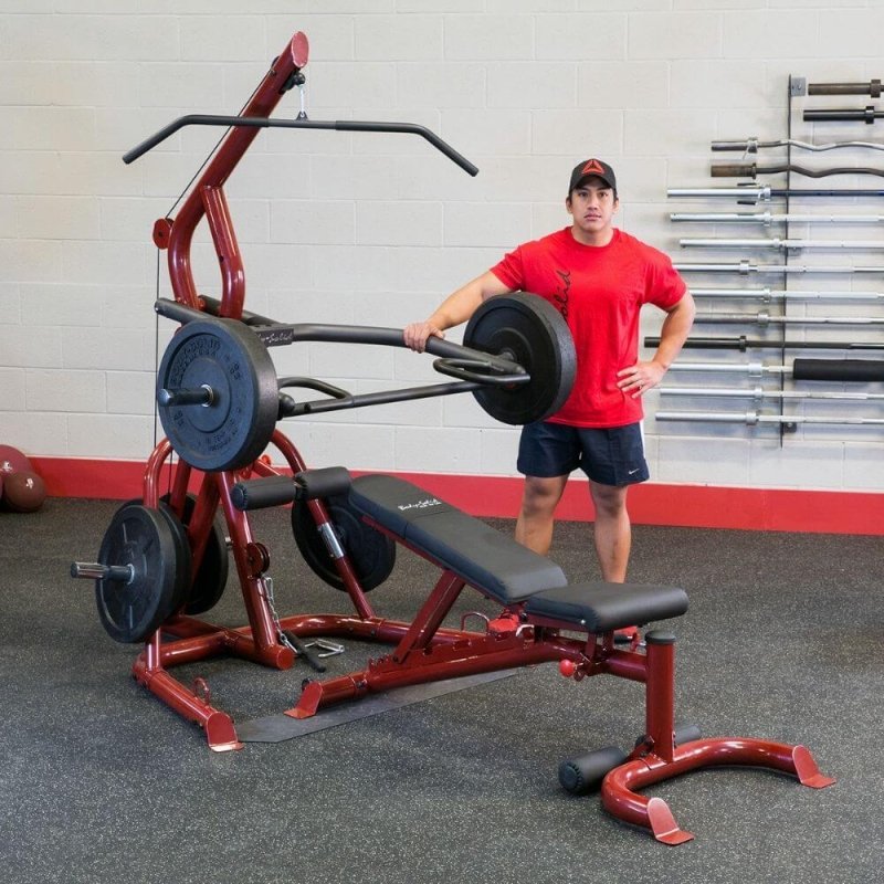 Body-Solid Corner Leverage Gym GLGS100 - Man standing behind the actual product