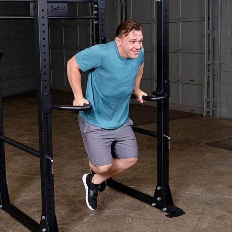 Body-Solid Dip Handles GPRDH - man workout using the handles in Dip position