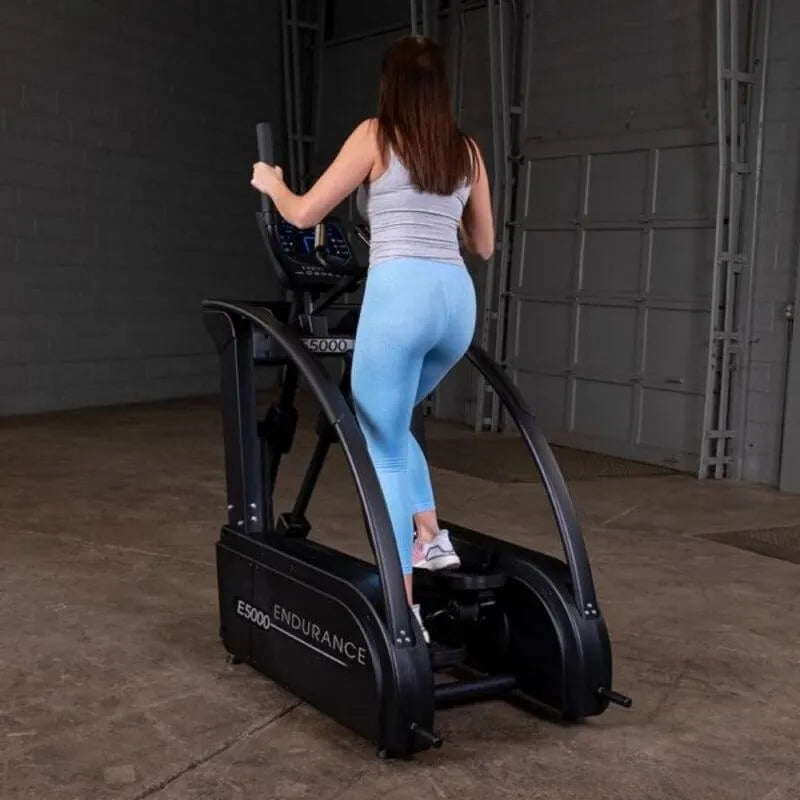 Body-Solid Endurance Center Drive Elliptical E5000 - back photo of the woman working out 