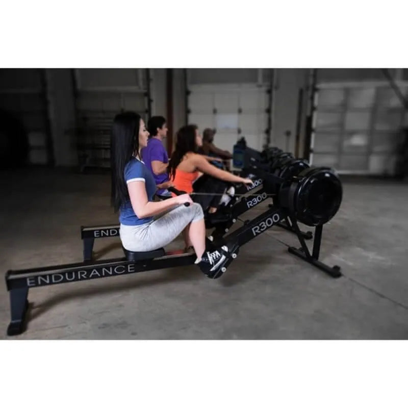 Body-Solid Endurance Indoor Rower R300 - side view photo of the people working out