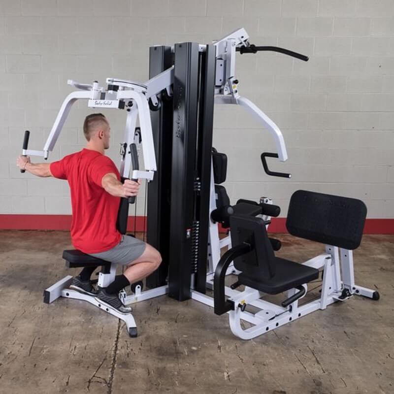 Body-Solid EXM3000LPS Multi-Stack Home Gym - Man working on reverse fly