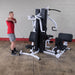 Body-Solid EXM3000LPS Multi-Stack Home Gym - Man on training upright row exercise