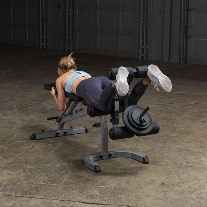 Body-Solid Flat Incline Decline Bench GFID31 - woman lying down using leg support exercise 