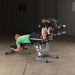 Body-Solid Flat Incline Decline Bench GFID71 - Man laying on his stomach on bench decline