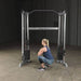 Body-Solid Functional Training Center GDCC200 - woman on squat holding the handle to pull