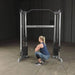 Body-Solid Functional Training Center GDCC200 - woman on squat holding the handle to pull