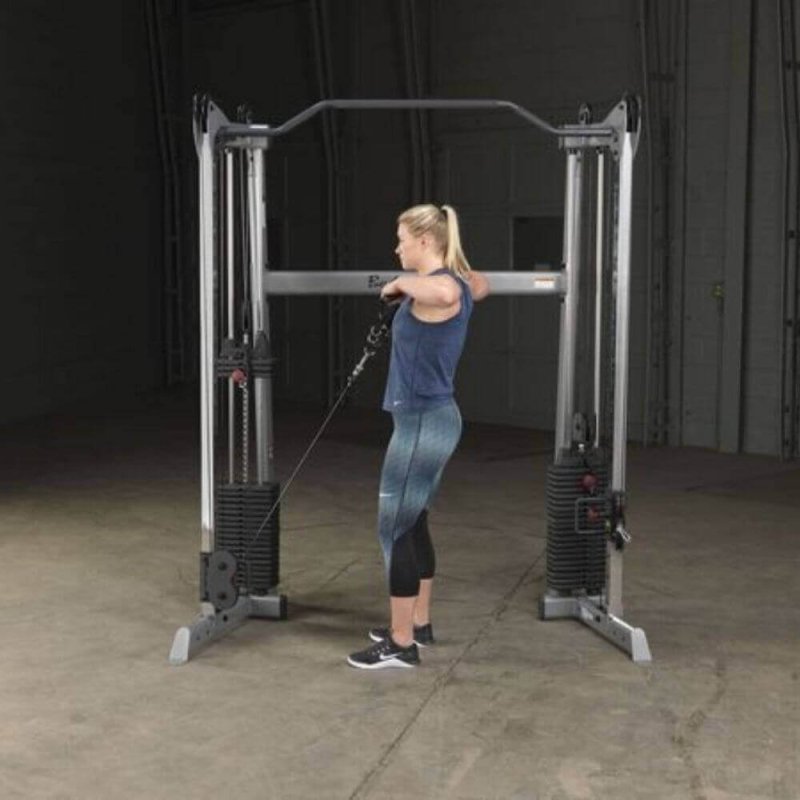 Body-Solid Functional Training Center GDCC200 - woman working out sholder press