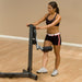 Body-Solid Fusion Multi-Hip Station FMH - woman holding the product while right foot on cushioned