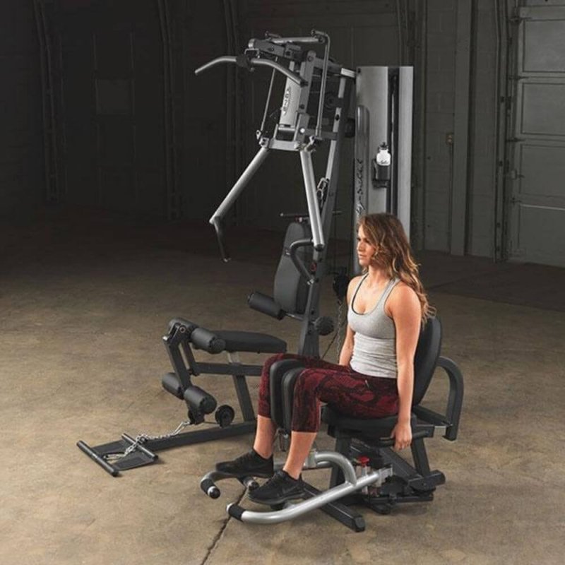 Body-Solid G Series Inner and Outer Thigh Attachment GIOT - actual product with woman seating in cushioned support