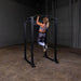 Body-Solid GPR400 Power Rack - Woman using the product pull up position