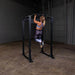 Body-Solid GPR400 Power Rack - Woman using the product pull up position