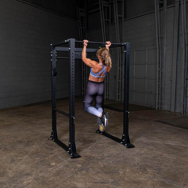 Body-Solid GPR400 Power Rack - Woman using the actual product doing chin up exercise