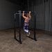 Body-Solid GPR400 Power Rack - Woman using the actual product doing chin up exercise