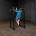 Body-Solid GPR400 Power Rack - Man on actual product doing chin up exercise