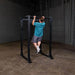 Body-Solid GPR400 Power Rack - Man on actual product doing chin up exercise
