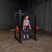 Body-Solid GPR400 Power Rack - Woman holding the barbell