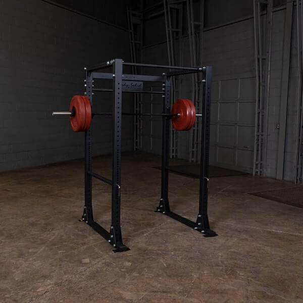 Body-Solid GPR400 Power Rack - Rack with barbell and plates in RED