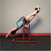 Body-Solid Inversion Table GINV50 - side view photo of the product and a woman in training