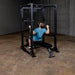 Body-Solid Lat Pull Attachment GLA400. - man working out lat pulldown on an actual product
