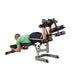 Body-Solid Leg Developer Attachment GLDA3 man in inclined position, using leg support with weight plate