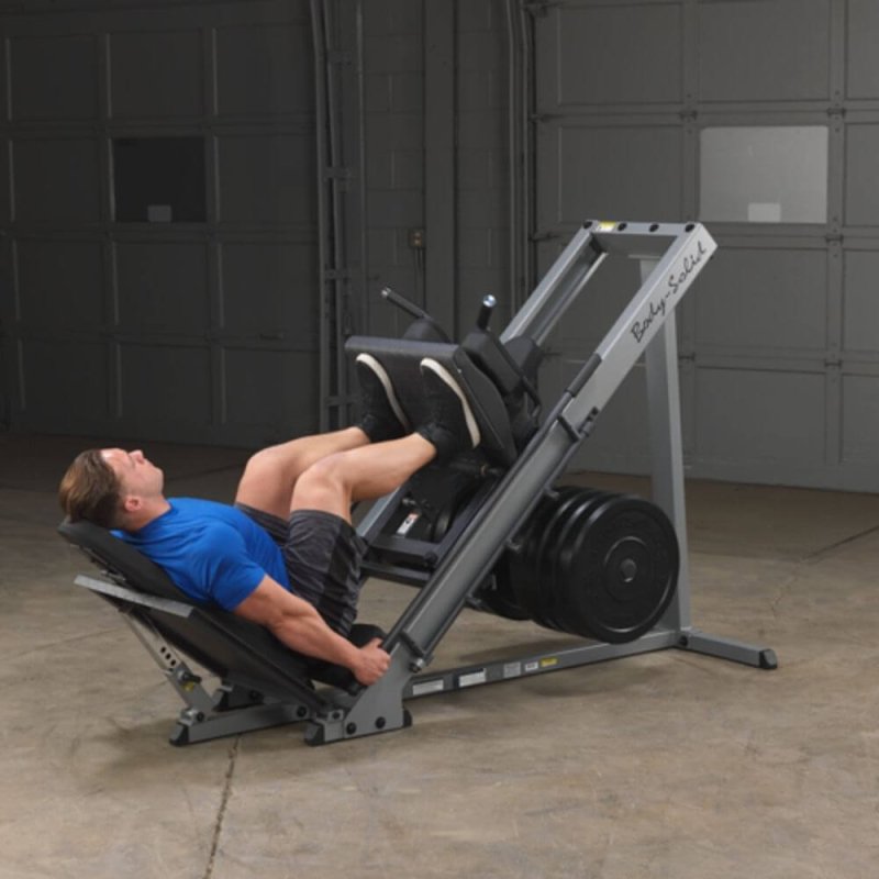 Body-Solid Leg Press & Hack Squat GLPH1100 - Man on a leg press exercise