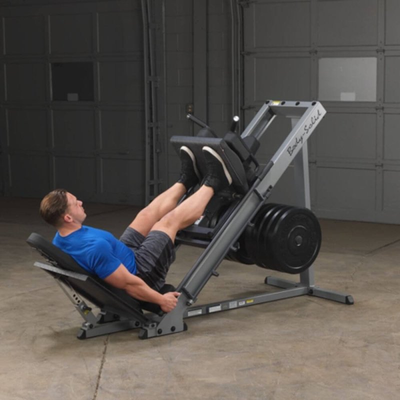 Body-Solid Leg Press & Hack Squat GLPH1100 - Side view picture of man on leg press excercise