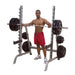 Body-Solid Multi Press Rack GPR370 - man standing inside the rack while holding a barbell rod