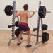 Body-Solid Multi Press Rack GPR370 - Man working out holding the barbell from the rack