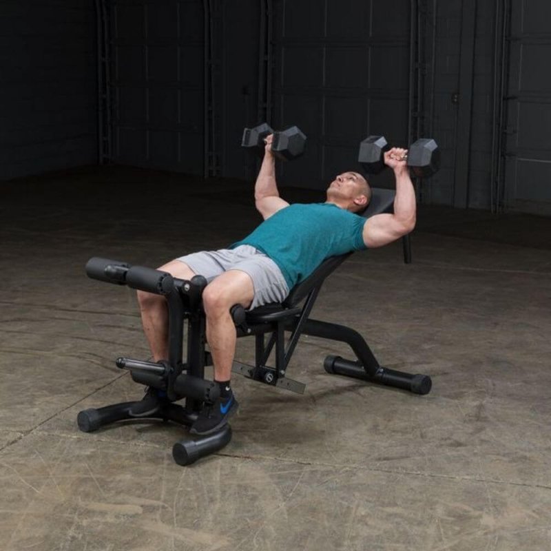 Body-Solid Olympic Leverage Exercise Bench with Leg Developer FID46 - Man slightly inclined in bench press