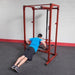 Body-Solid Power Rack Dip Attachment DR100 - man doing push ups with the actual product