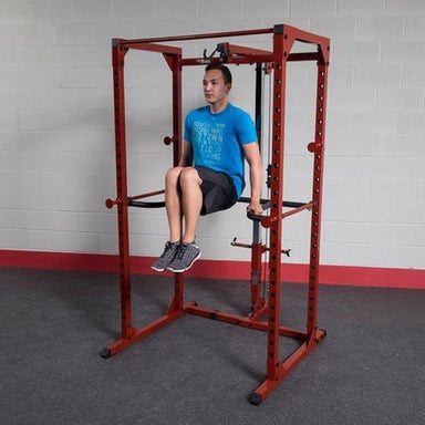 Body-Solid Power Rack Dip Attachment DR100 - man working out in knee raise