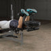 Body-Solid PowerCenter Rack Bench Combo GDIB46L - Close photo of leg curl exercise on actual product