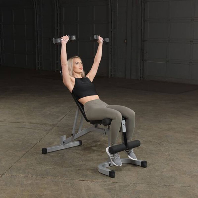 Body-Solid Powerline Flat Incline Decline Bench PFID130X - woman exercising on the bench