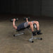 Body-Solid Powerline Flat Incline Decline Bench PFID130X - man using the bench for exercise