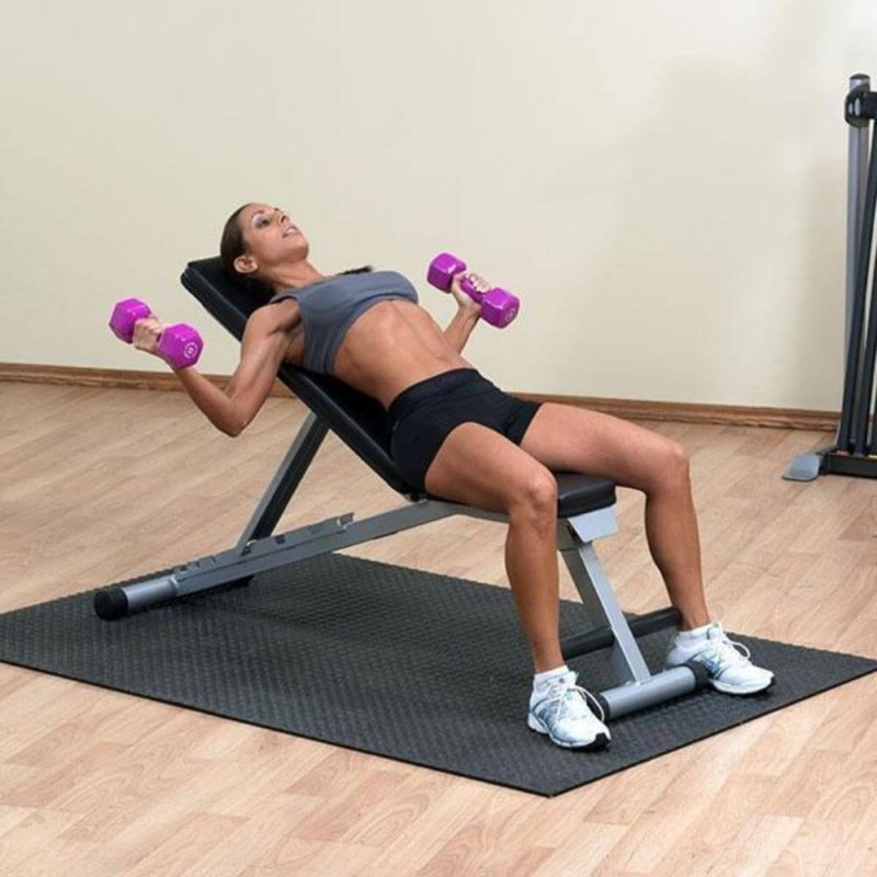 Body-Solid Powerline Folding FID Bench PFID125X - woman exercising on the bench