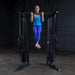 Body-Solid Powerline PFT100 Functional Trainer - woman doing pull-ups 