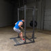 Body-Solid Powerline Half Rack PPR500 - man doing resistance training