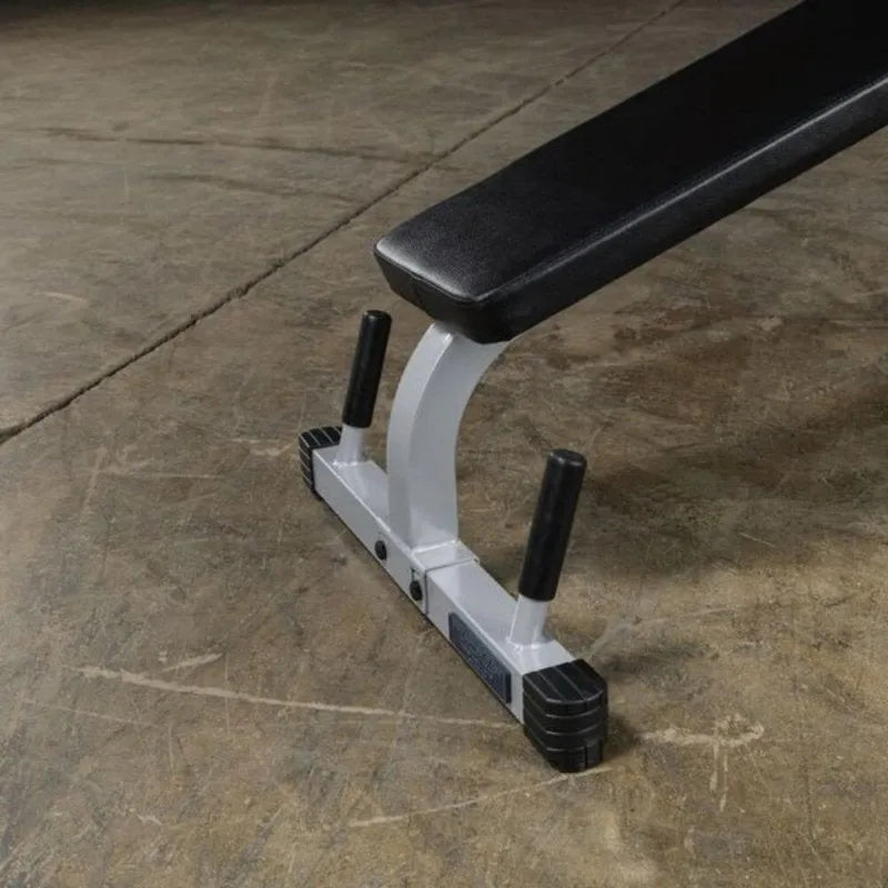 Body-Solid Powerline Leg Extension & Curl Machine PLCE165X - black and white bench